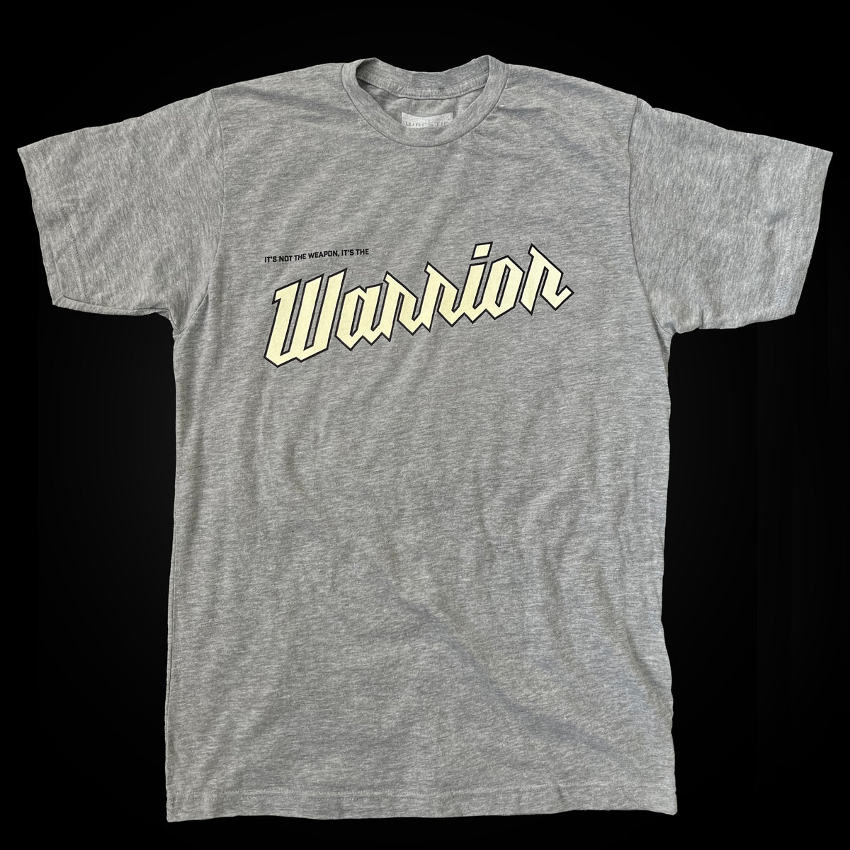 NOT THE WEAPON, THE WARRIOR TEE (GRAY)