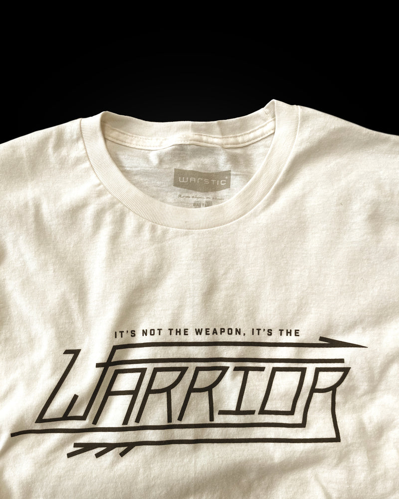 NOT THE WEAPON, THE WARRIOR TEE (VINTAGE WHITE)